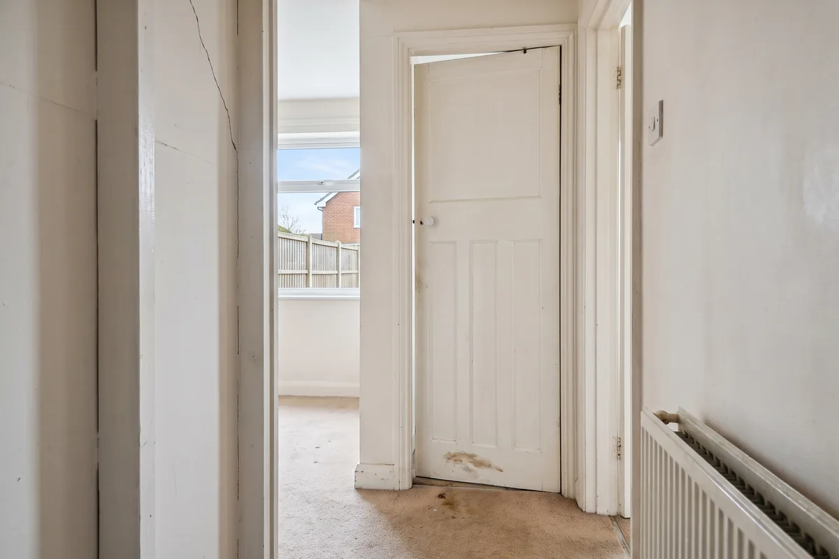 A stud wall feels like it moves, or a door has started sticking — structural carpentry & repairs